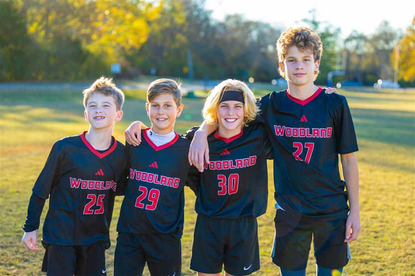 Middle school students play soccer